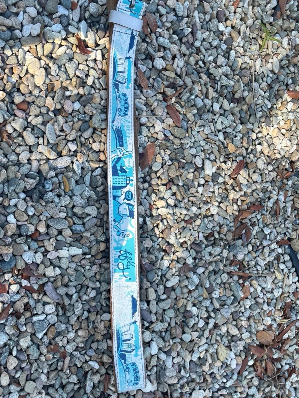 Vintage 80s blue and white FFLY Hope project leather belt with silver buckle.